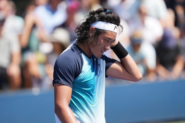 半岛体育-张之臻丢赛点五盘告负 大满贯首胜这么近那么远？